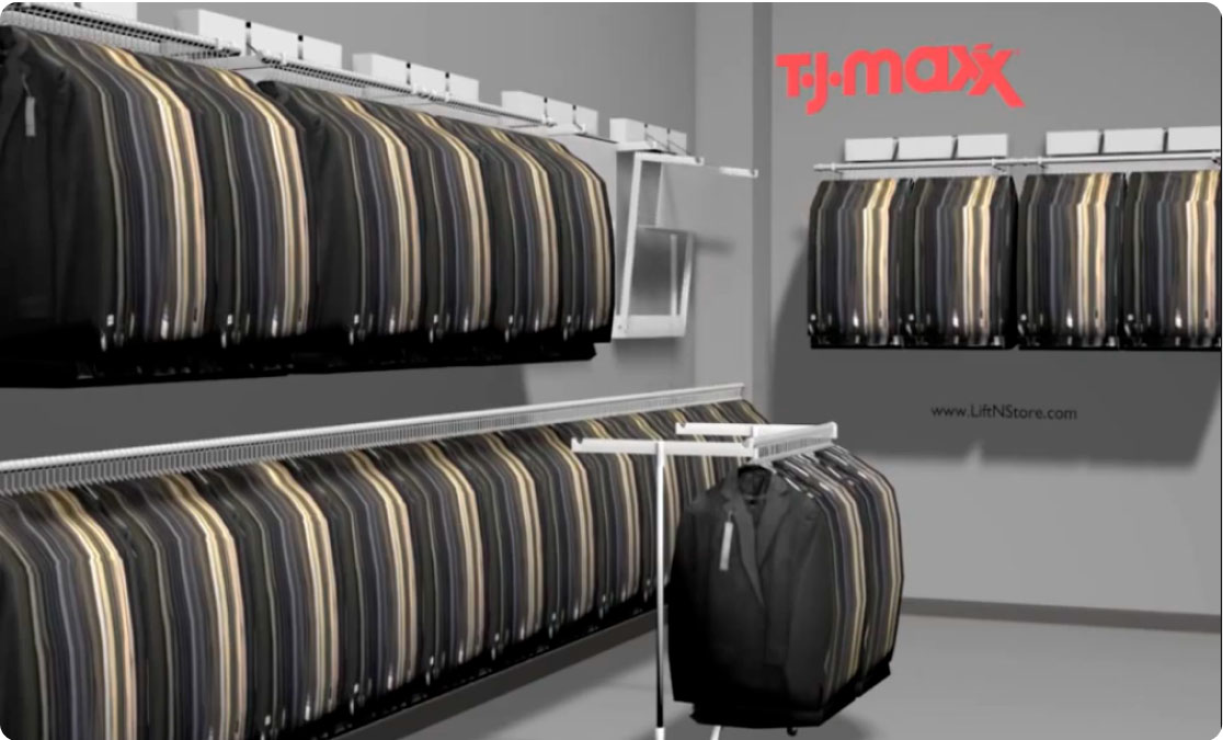 multiple suits hanging on clothes racks