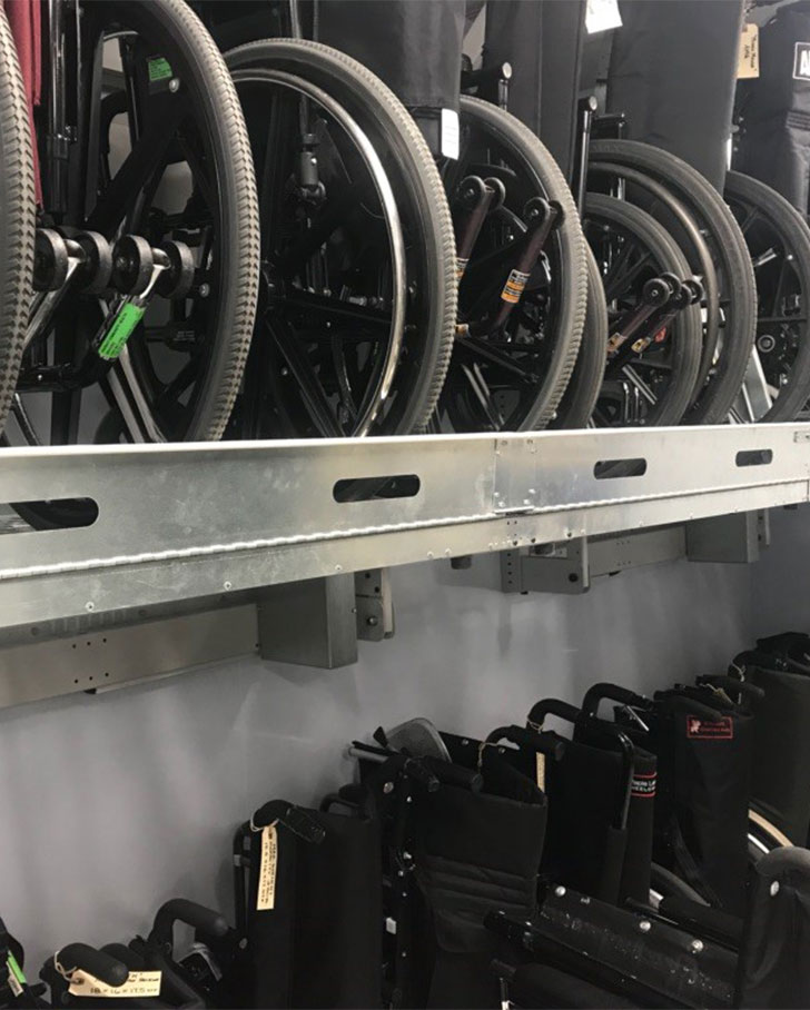 storage unit for wheelchairs in medical facility